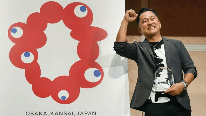 Artist Shimada Tamotsu at the unveiling of the Expo 2025 logo. Source: Financial Times https://www.ft.com/content/14fb8242-89f0-4090-b67e-deea4c918b2b 