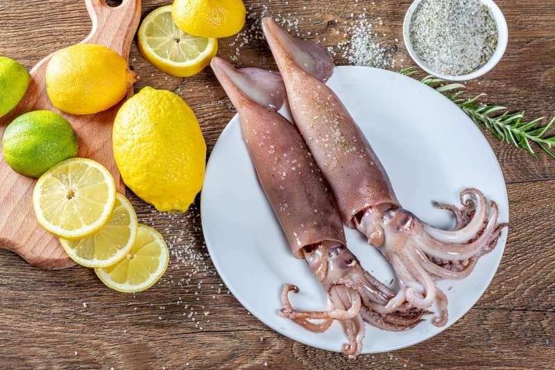 Seasoned squid ready to be grilled