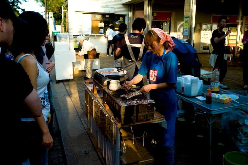Street vendor selling fresh grilled Ikayaki